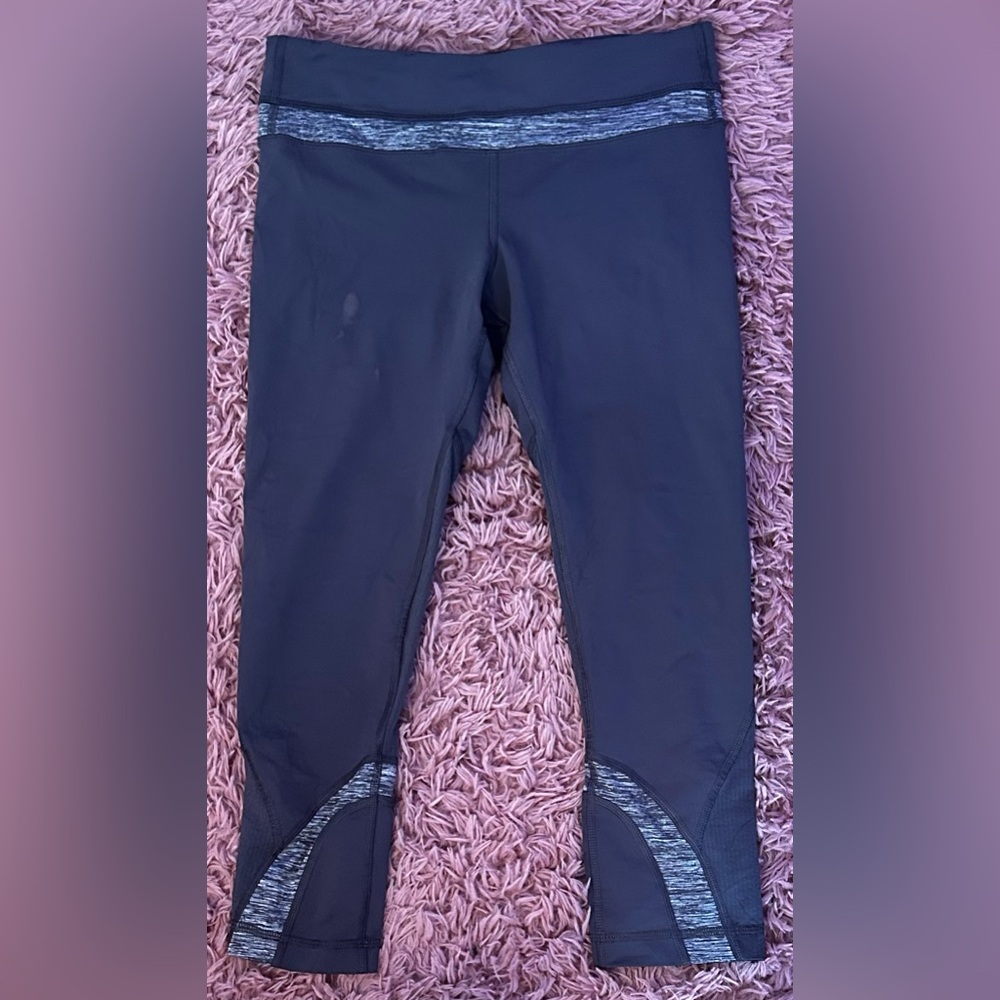 I’m selling worn grey lululemon leggings that do have a small stain on the front